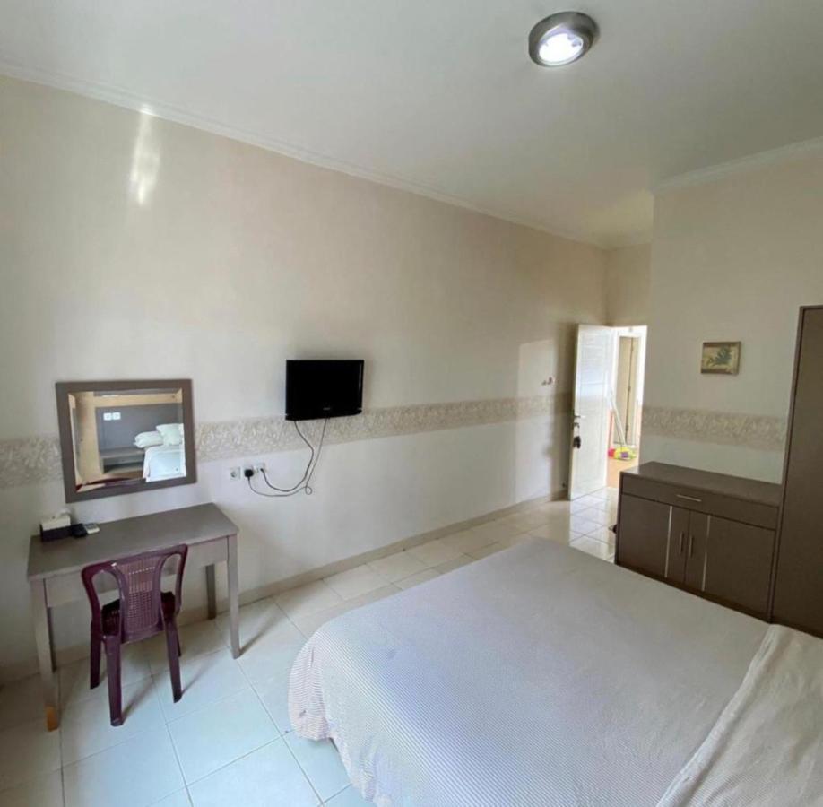 Hotel Roemah Moesi Medan Esterno foto