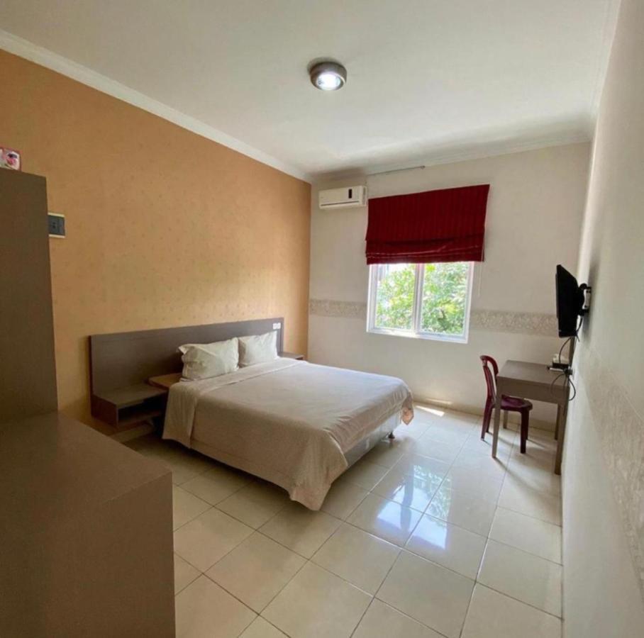 Hotel Roemah Moesi Medan Esterno foto