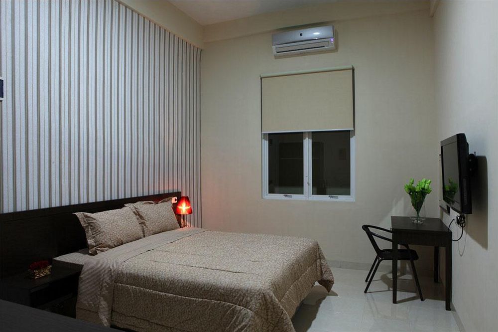 Hotel Roemah Moesi Medan Esterno foto